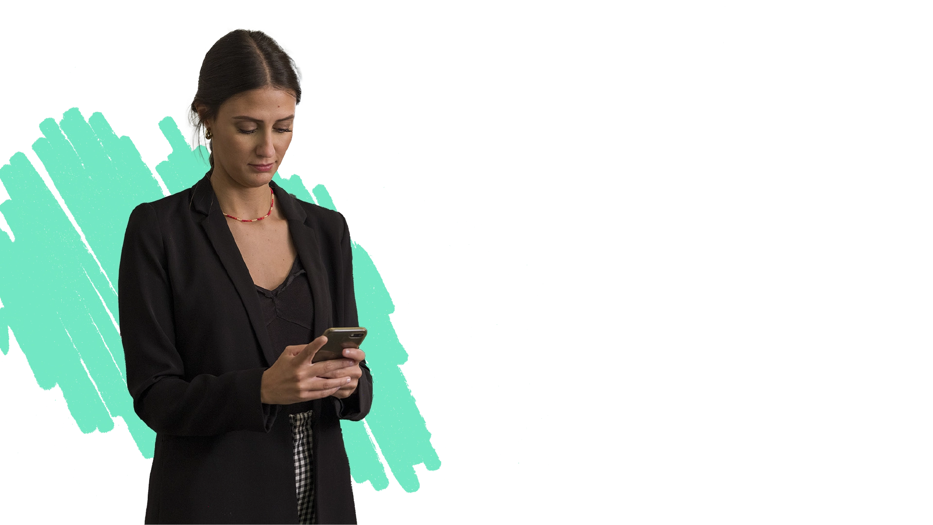Image from the Info Save campaign, where a woman dressed elegantly is attentively looking at her phone, smiling casually and relaxed in front of the camera.