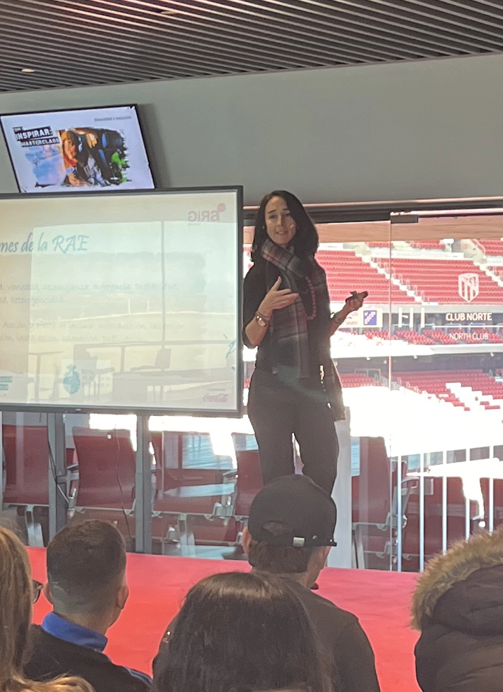 Elena Martín, Director of Sustainability, speaks about the importance of diversity and inclusion at the Cívitas Metropolitano on a sunny day, with the stadium in the background.