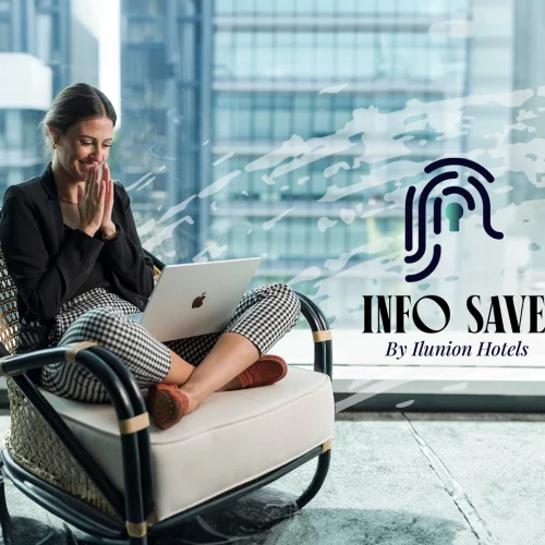A person is sitting using a laptop in front of a large window with modern buildings, where a fingerprint and the text “INFO SAVE By Ilunion Hotels” appear.