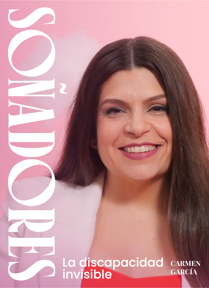 The image features a woman with long, dark hair, smiling brightly. She is wearing a white blazer over a red top. The background is a soft pink tone that conveys warmth. On the left side of the image, the word “SOÑADORES” appears in large, vertical letters, while at the bottom, the phrase “Invisible Disability” suggests the main theme. In the lower right corner, the name “CARMEN GARCÍA” identifies the person in the photo.
