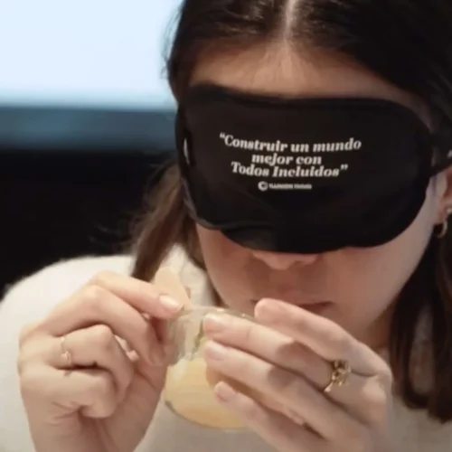 Girl wearing an ILUNION Hotels blindfold