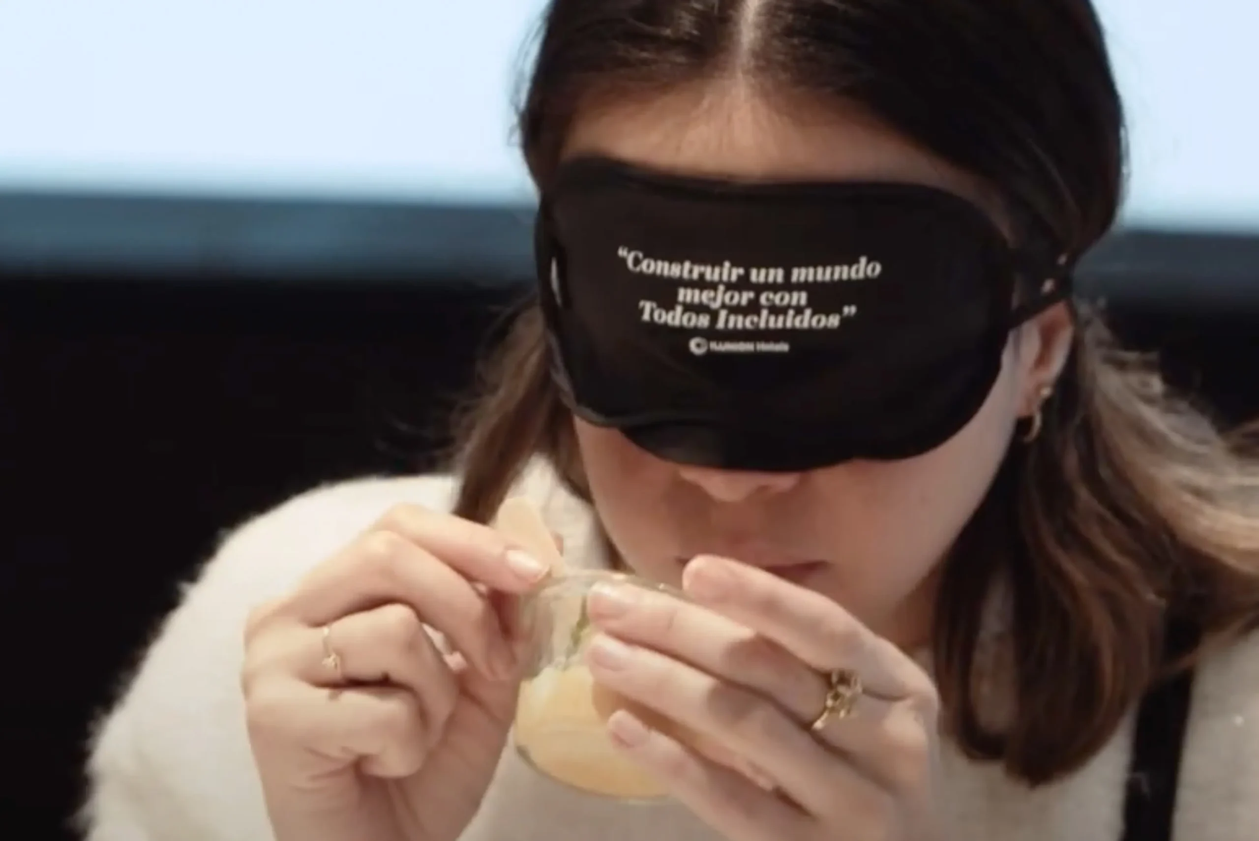 Girl wearing an ILUNION Hotels blindfold