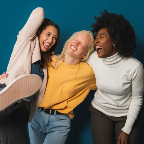 Girls of diverse backgrounds laughing