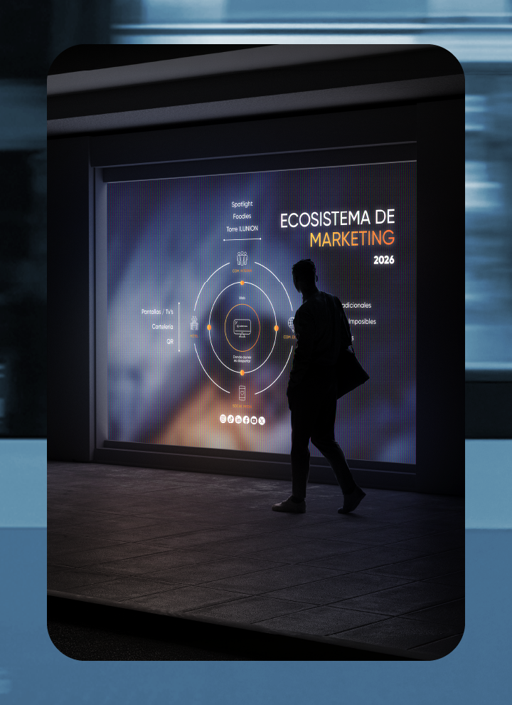Persona caminando frente a una pantalla digital iluminada que muestra una infografía titulada “Ecosistema de Marketing 2026”, con un diagrama circular sobre canales de comunicación y marketing.